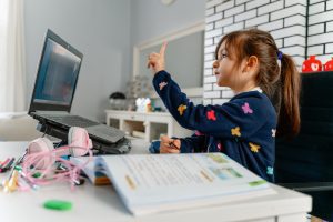 An online student presents to a virtual classroom.