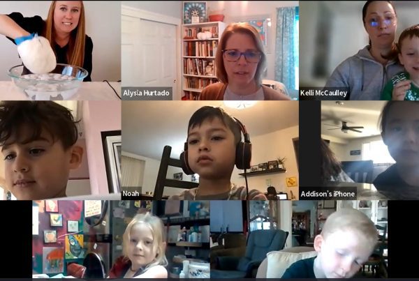 Compass Charter School scholars and learning coaches attend a virtual science class. A fun science teacher demonstrates an experiment.